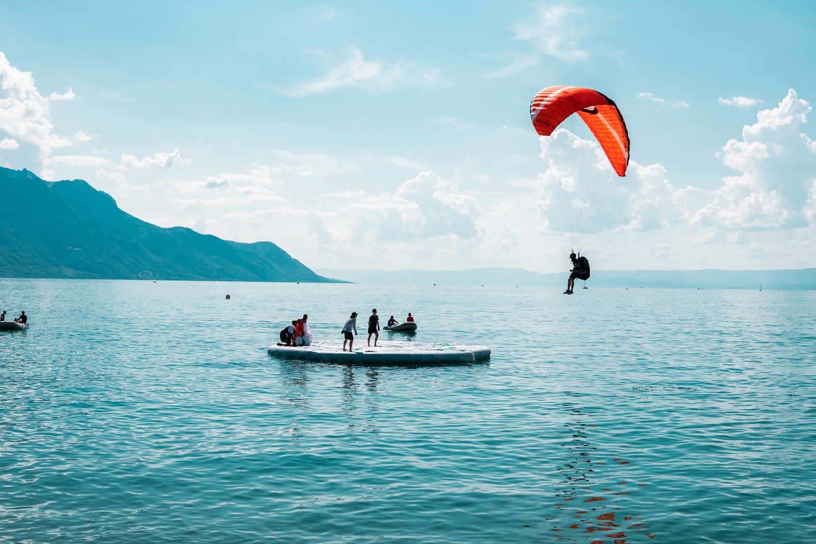 Friends sailing on lake